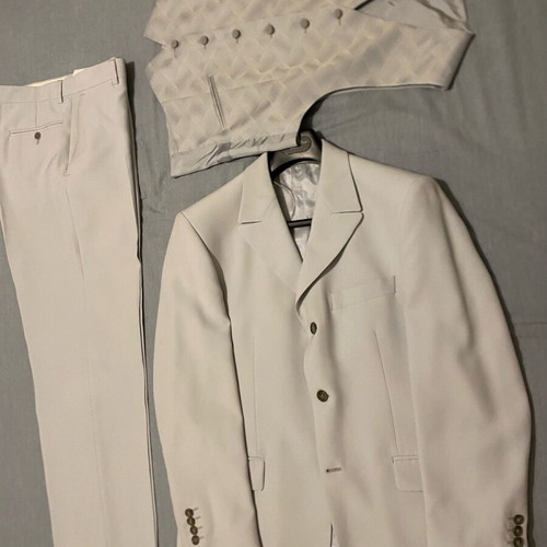 Manuel suit with vest very light blue like new