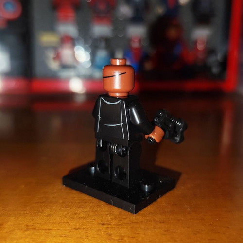 Nick Fury figure like new with stand and pistol
