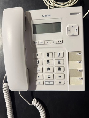 Alcatel phone almost like new, white wired