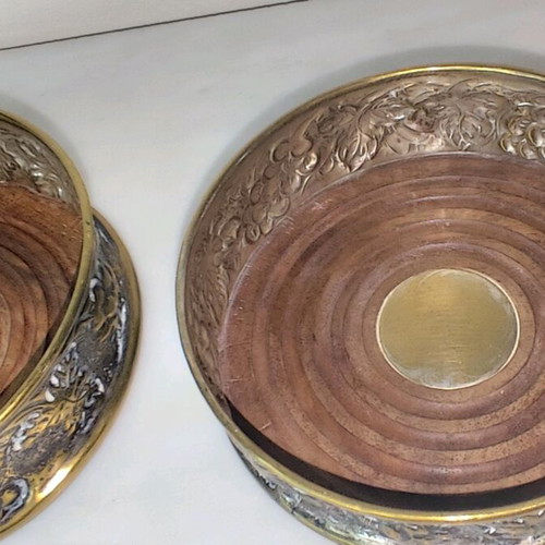 Wine Coasters used, silver metal with wooden base, repoussé grape motif