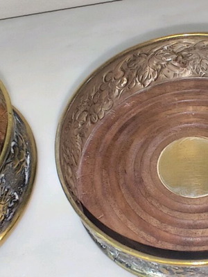 Wine Coasters used, silver metal with wooden base, repoussé grape motif