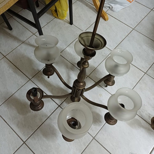 Chandelier used with frosted glass shades