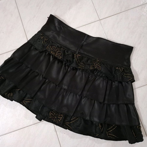 Satin mini skirt black like new with layered ruffles and gold details