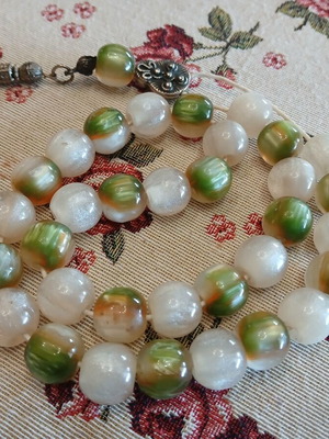 Worry beads used, two-tone resin with vintage metal details