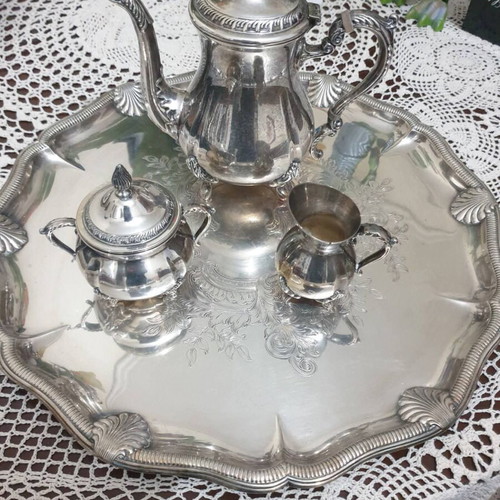Silver-plated set with tray, teapot, creamer and sugar bowl like new