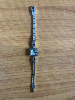 Gucci G-Mini watch used with diamonds, silver bracelet