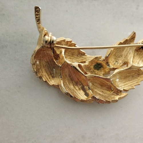Pin used, old, gold-colored