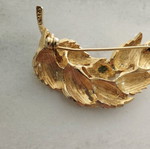 Pin used, old, gold-colored