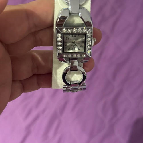 Watch, ring, and earrings set like new, gray