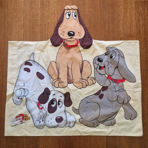 Pillowcase with Pound Puppies design, new