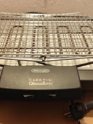 Delonghi electric grill with rotating base