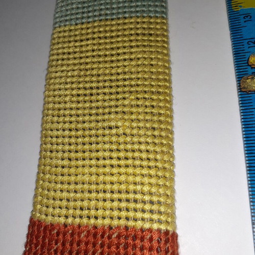 Handmade embroidered bookmark in red, yellow and light blue