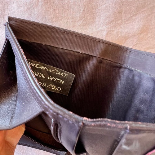 Mandarina Duck wallet used, purple color