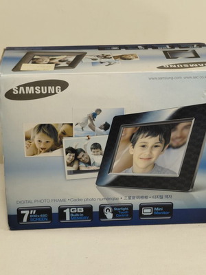 Samsung SPF-71ES digital photo frame used, 7-inch screen, 1GB memory