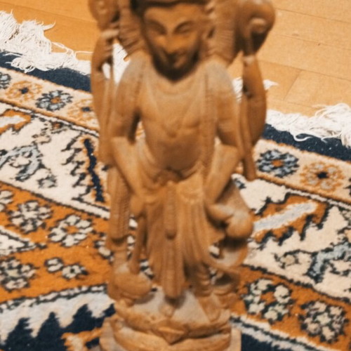 Handmade Indian wooden statue of Hindu deity Lord Vishnu or variant