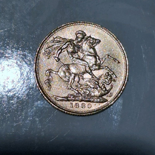 Collectible gold English sovereign Queen Victoria 1880 and 1890 like new