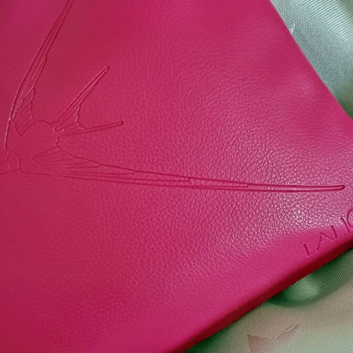 Lalique leather handbag like new, pink