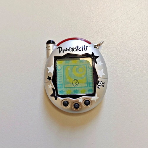 Tamagotchi Connection V3 Silver Star 2004 like new