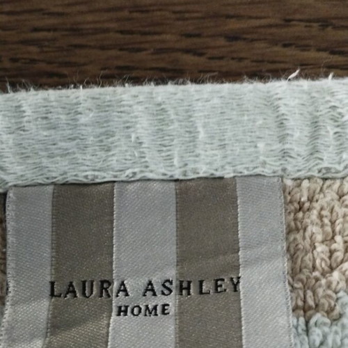 Laura Ashley face towel like new with geometric pattern light blue beige