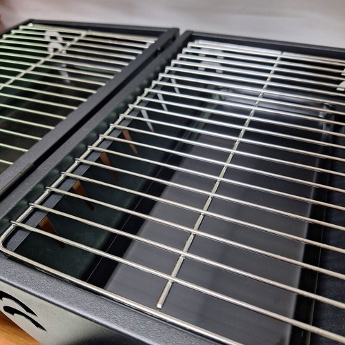 Portable grill with two cooking surfaces new