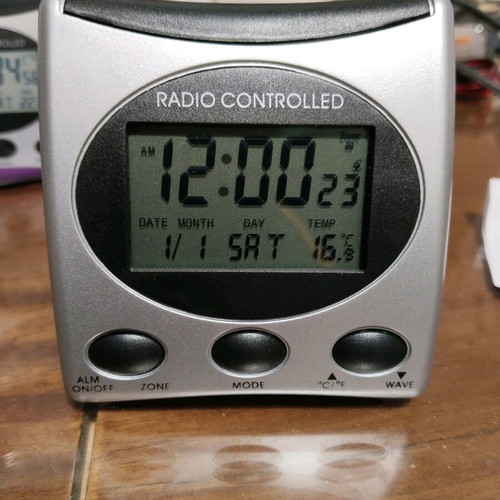 Radio controlled WT 321 digital alarm clock with temperature