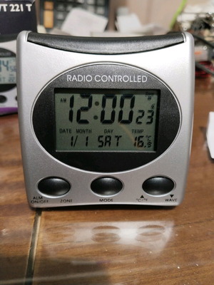 Radio controlled WT 321 digital alarm clock with temperature