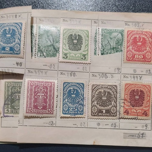 Stamp album used with Austrian stamps, all sealed with hinges