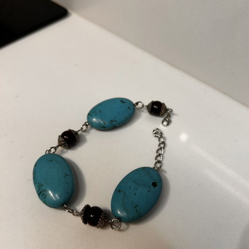 Summer bracelet with blue stones and black beads