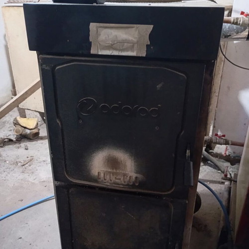 Podarosi SolidPlus wood burner boiler used with electronic control