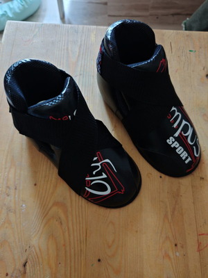 Olympus Sport small used protective foot guards