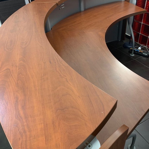 Reception desk used with metal perforated front panel
