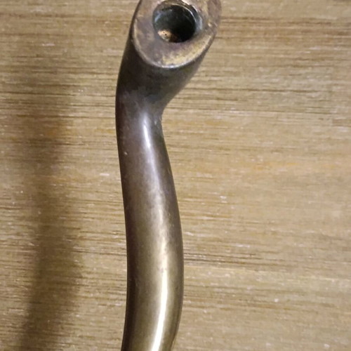 Pair of vintage brass door handles 1950 with natural patina used