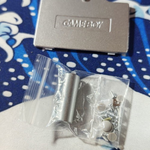 Silver Gameboy Advance SP shell with embossed Kyogre UV print