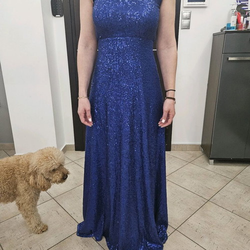 Diamond blue dress like new, open back with shoulder pads
