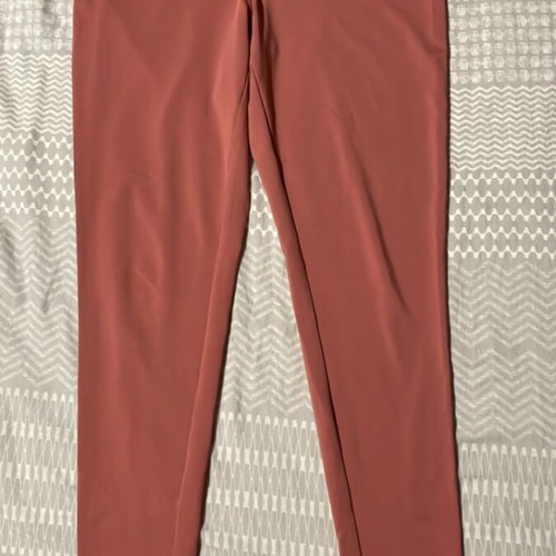 Women's pink gym leggings used, size M