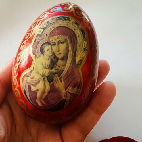 Handmade wooden decorative red egg like new with image of Virgin Mary