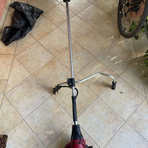 Homelite F3055 Petrol Lawn Mower used with accessories