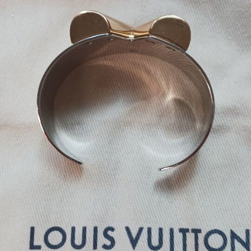 Louis Vuitton metal bracelet like new, gold and silver