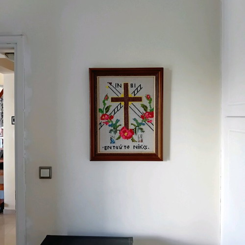 Hand-embroidered cross with wooden brown frame, like new