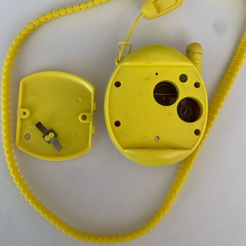 Tamagotchi 2006 yellow red flower used handheld virtual pet