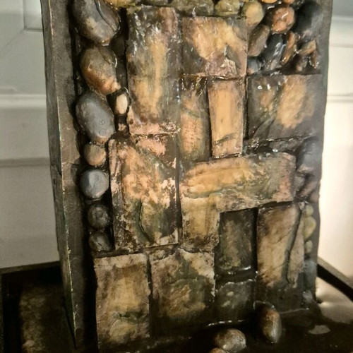 Decorative water fountain used with light
