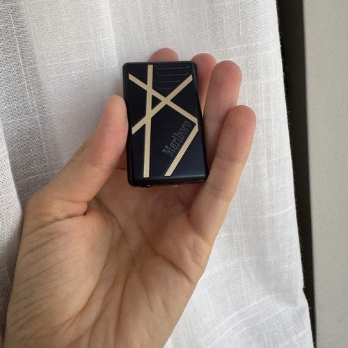 Marlboro lighter used with geometric lines design