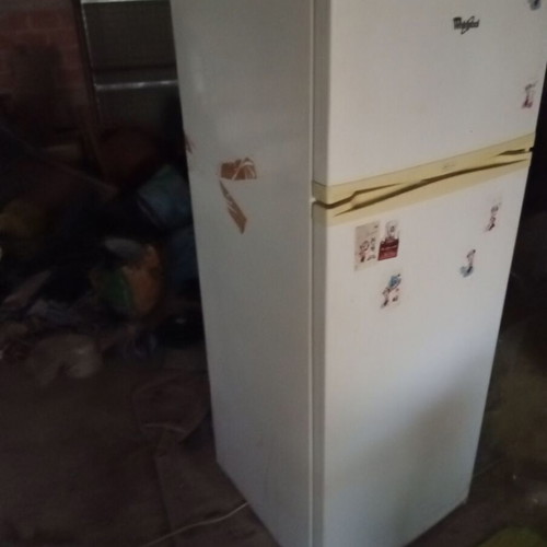 Whirlpool refrigerator with separate freezer and fridge door, like new