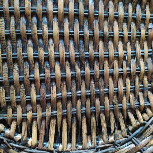 Woven rattan tray used with metal frame