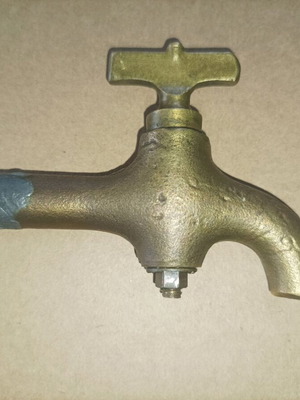 Bronze faucet used, old piece for decoration