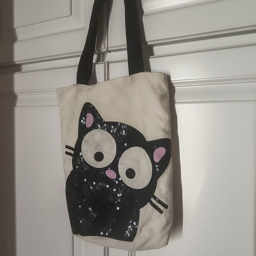 Fabric shoulder bag like new, ecru with black cat sequins design