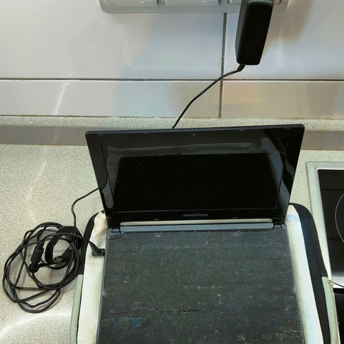 eMachines eM355 netbook 10.1" like new with charger
