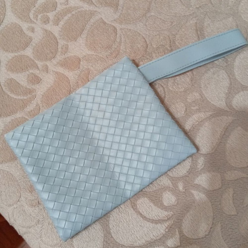 Light blue pouch and toiletry bag
