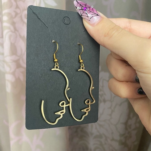 Boho face earrings new with steel hooks gold color
