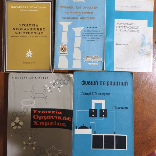 School books used with wear and notes, various years